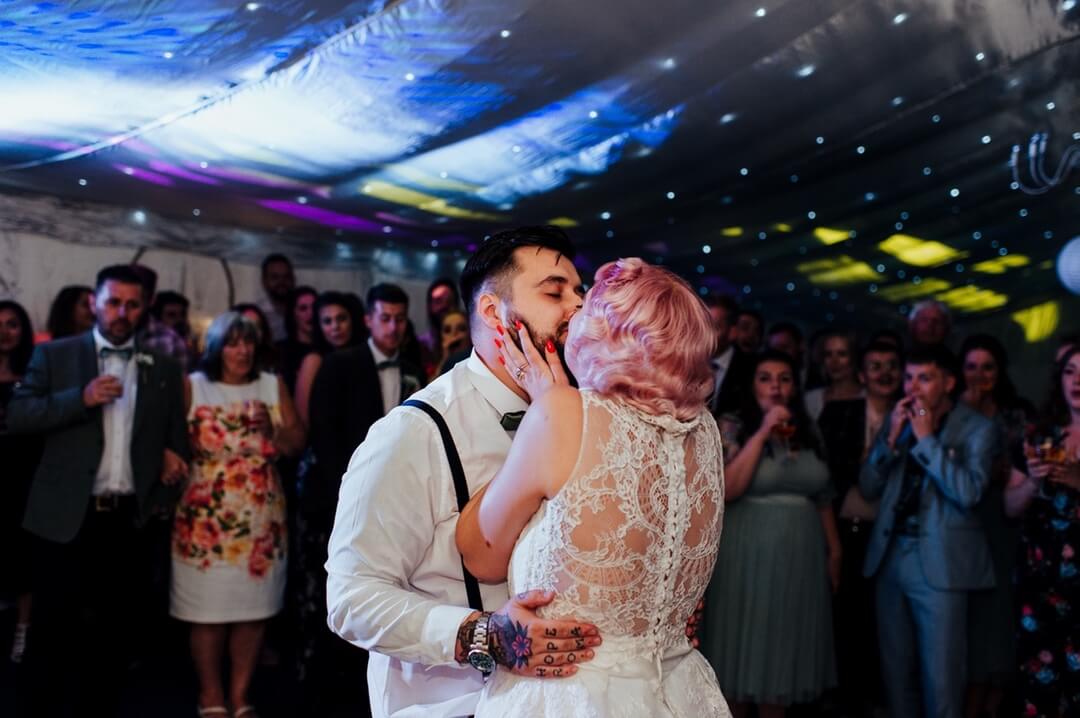 Alternative bride and groom on the dance floor