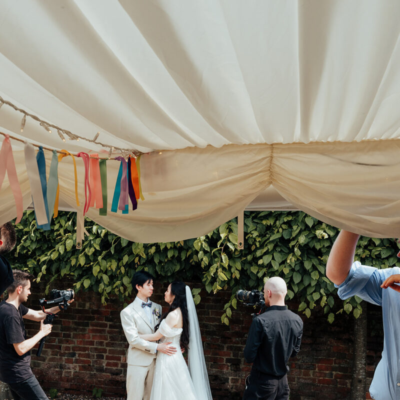 two wedding photographers getting in the way