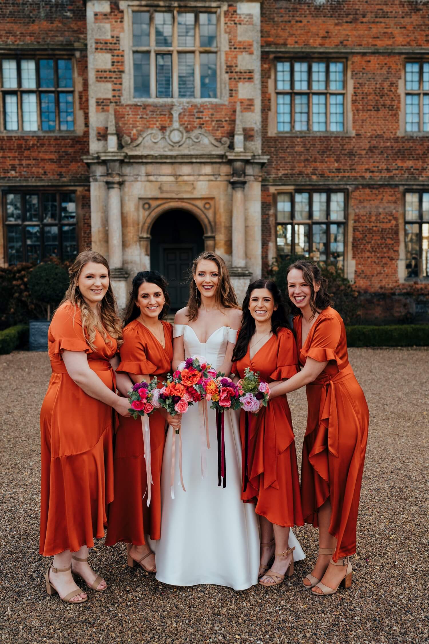 Bridesmaids outside Doddington Hall, wedding venue Lincolnshire