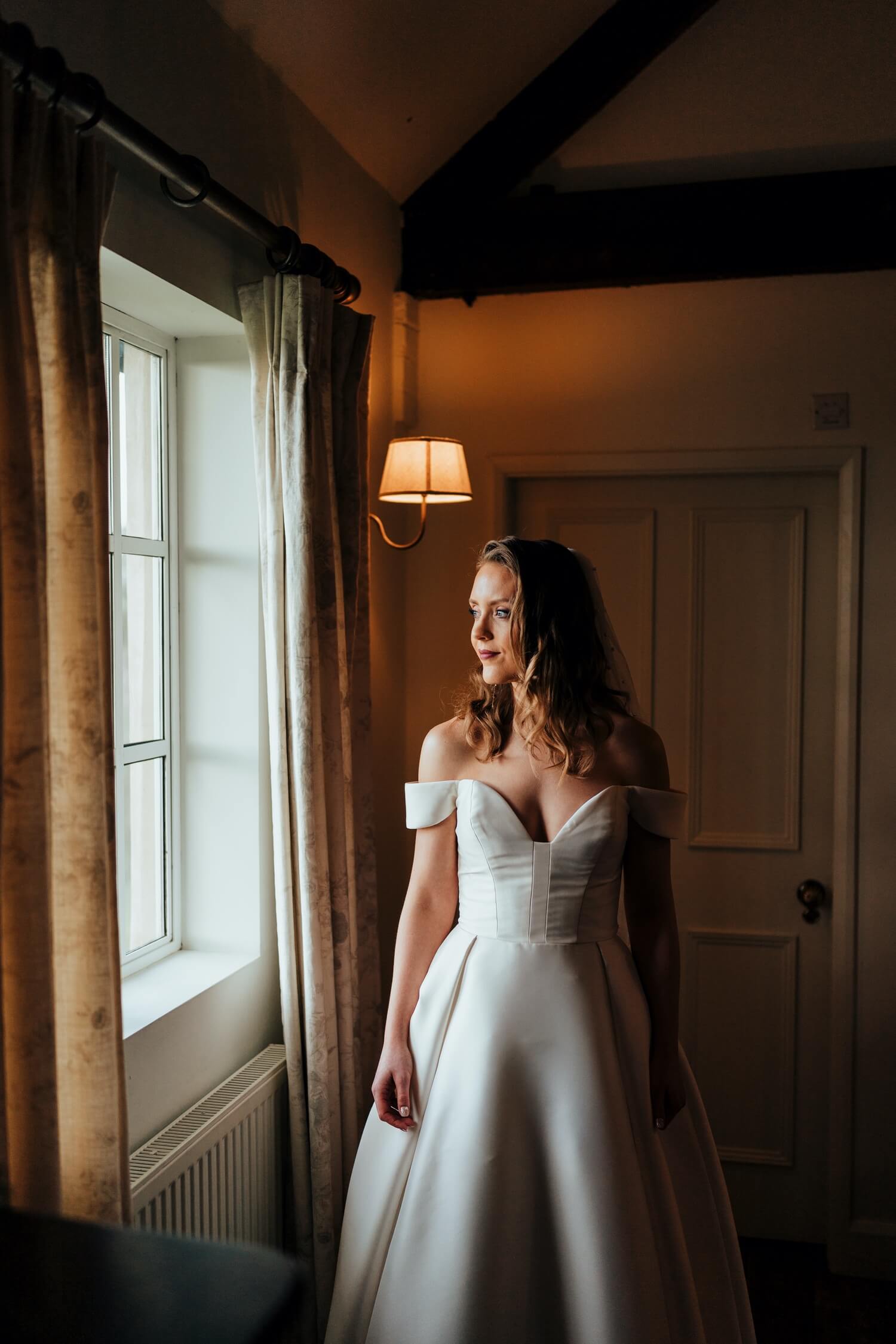 Bride in bridal suite at Doddington house