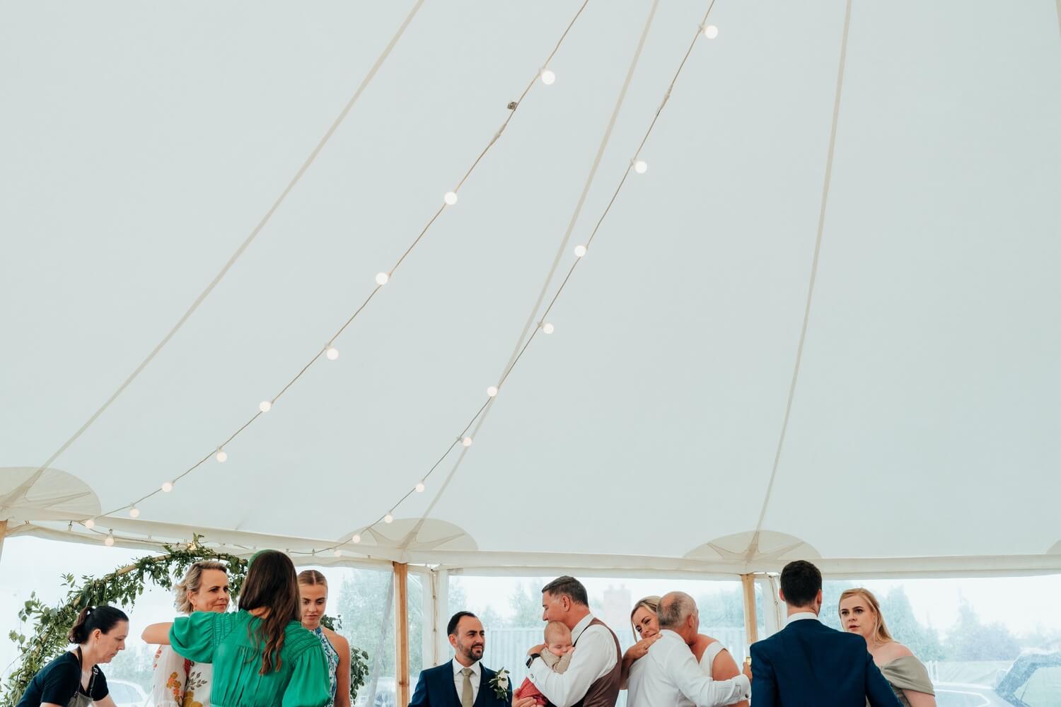 hugs at a Marquee Wedding in Derbyshire