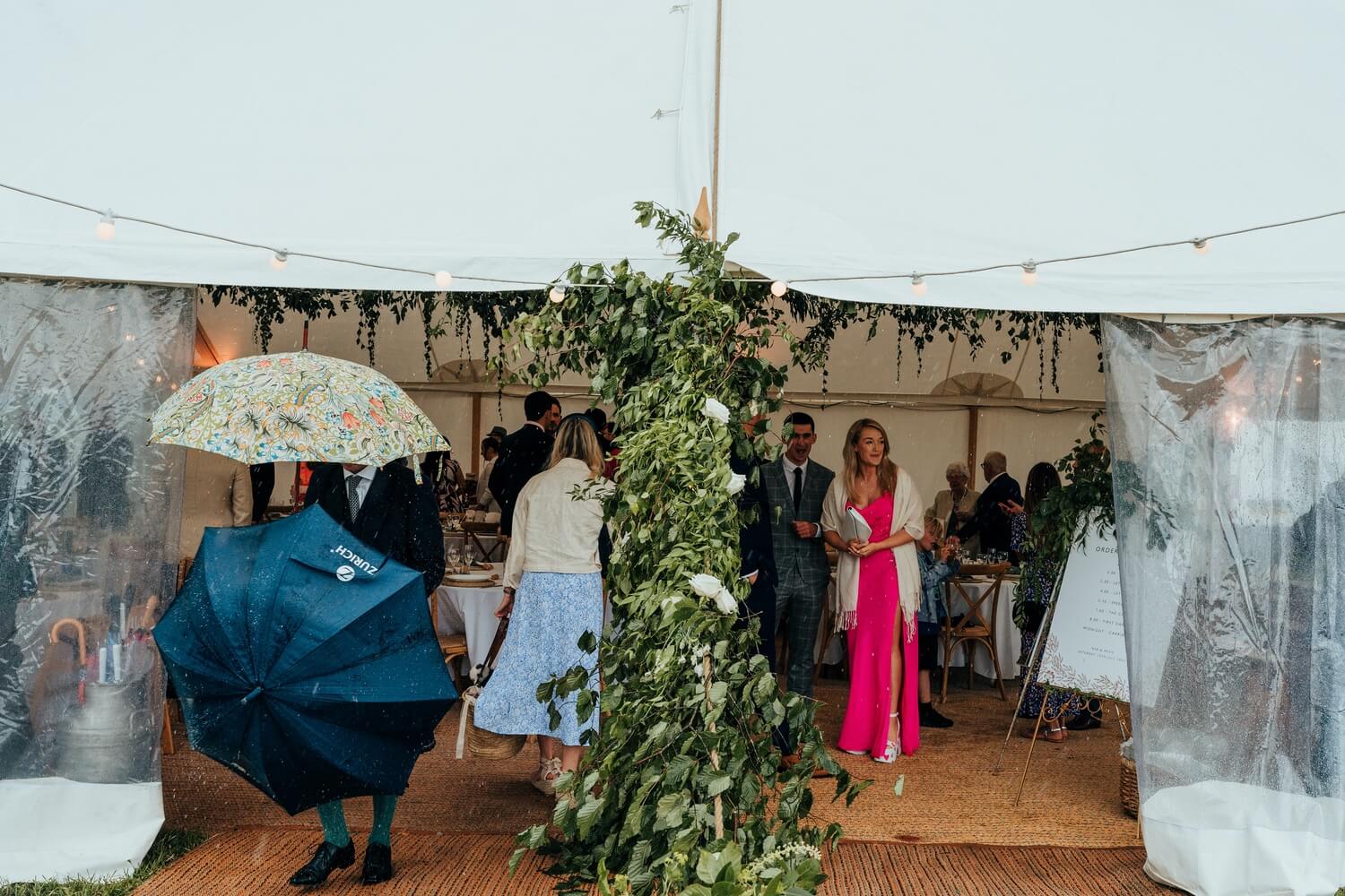 Marquee Wedding photography in Derbyshire in the rain