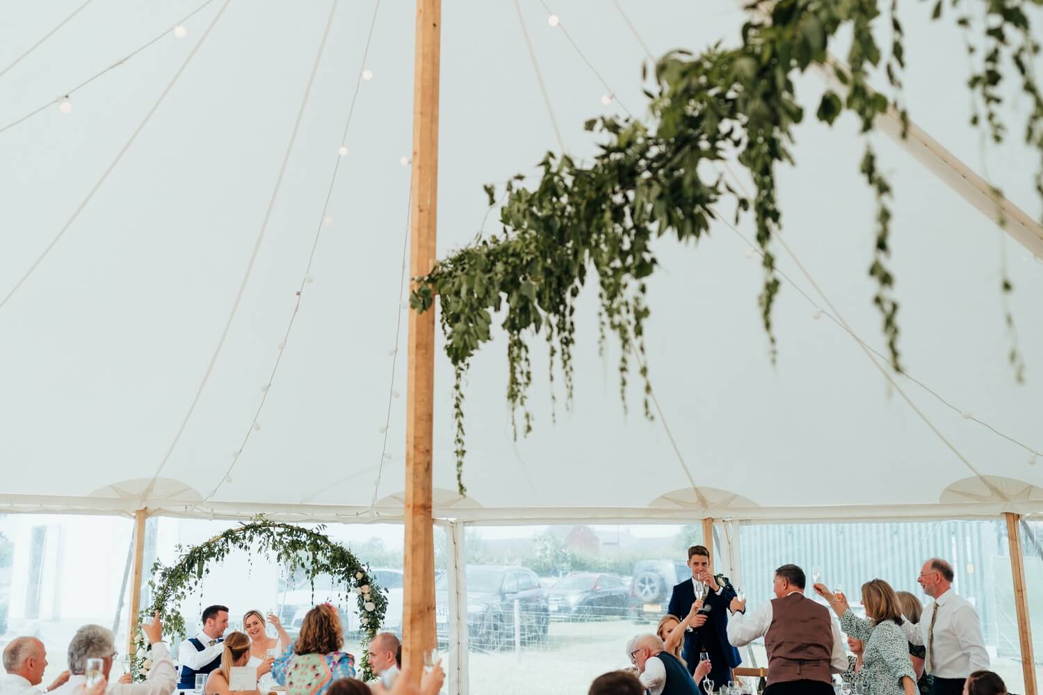 Marquee Wedding photography in Derbyshire - toast during speeches