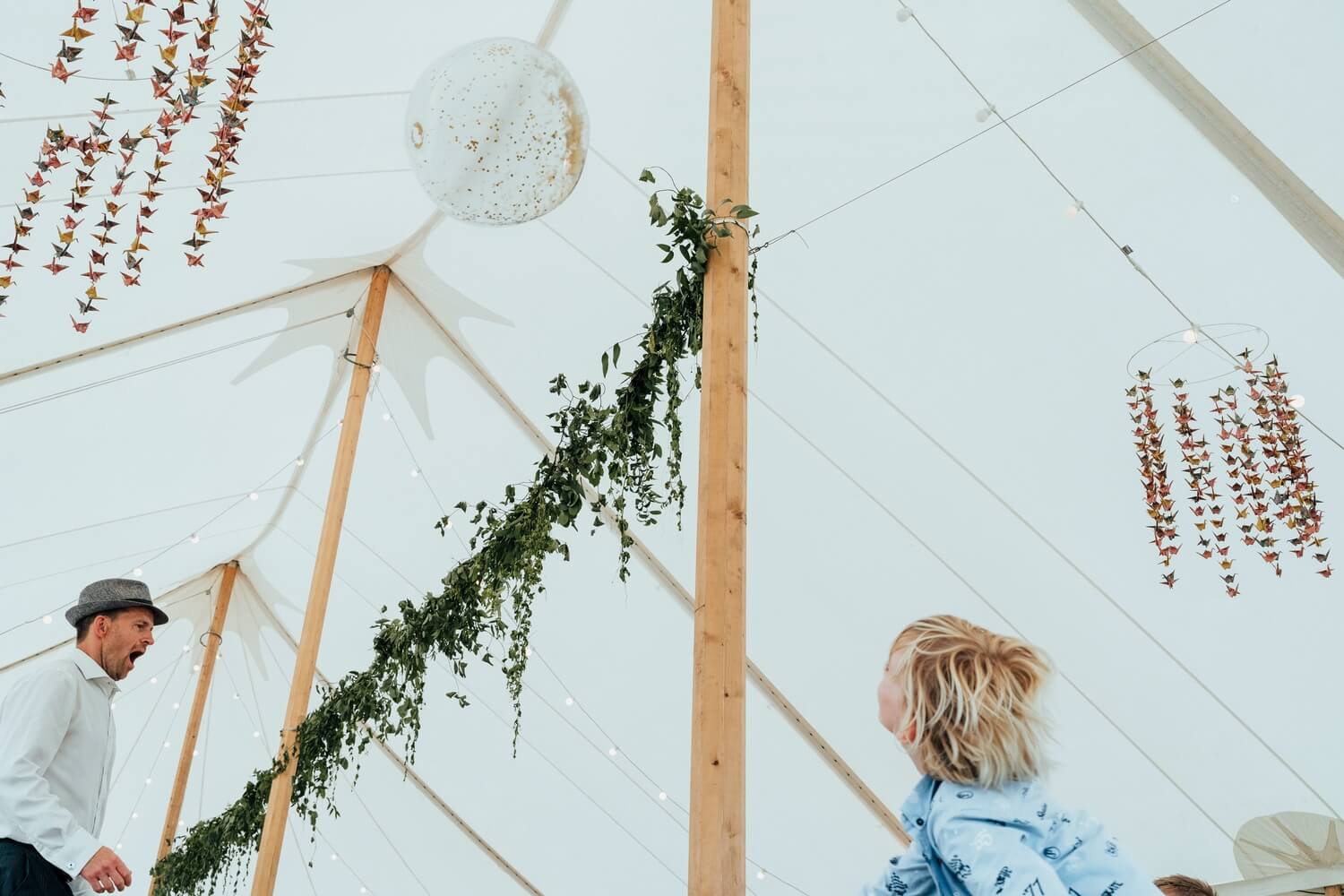 Marquee Wedding photography in Derbyshire - ball games under the marquee