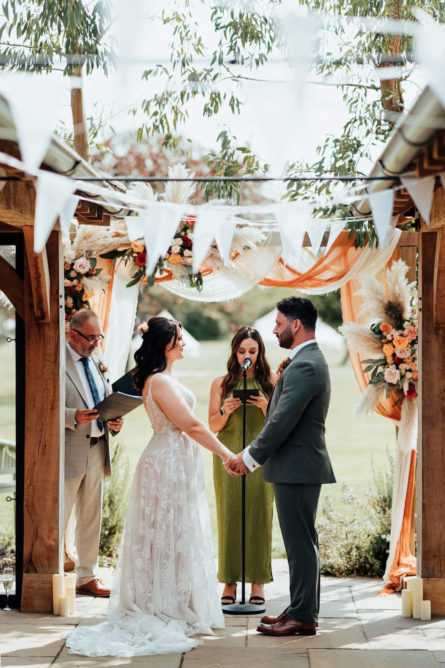 Bride and groom during wedding ceremony at Molecey Mill Wedding