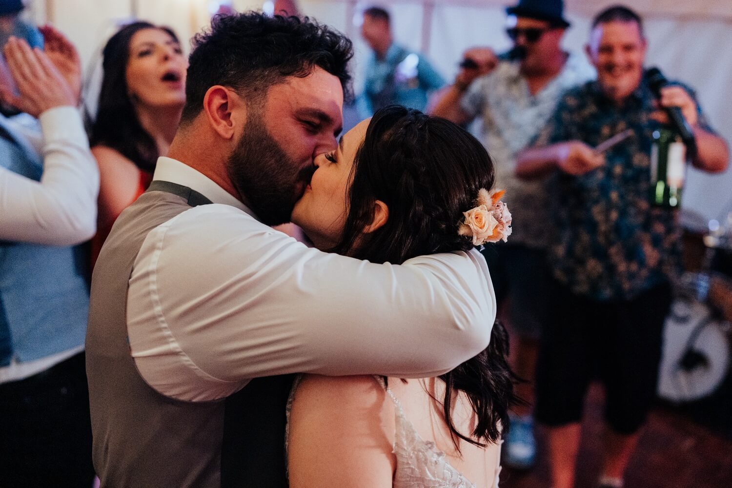 Bride and groom kiss on the dance floor wedding reception at Molecey Mill